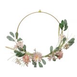A beautiful half wreath decorated with a pale pink flower finish and added foliage 