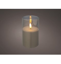 A realistic flickering LED wax candle with a glass surround 