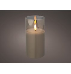   A clear glass surrounded LED Candle featuring a warm glow and flameless flicker 