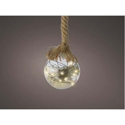 A clear glass bauble hung from a chunky rope hanger and perfectly set with Warm White Led lights 