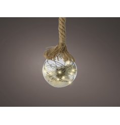 A clear glass bauble hung from a chunky rope hanger and perfectly set with Warm White Led lights 