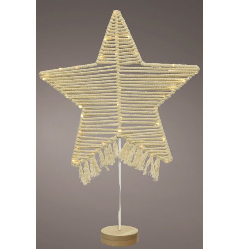 A boho inspired macrame based Star ornament set with added LED lights and a simplistic charm 