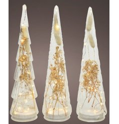   A mix of shaped clear Christmas Tree Decorations, each filled with dried grasses and warm glowing LED Lights 