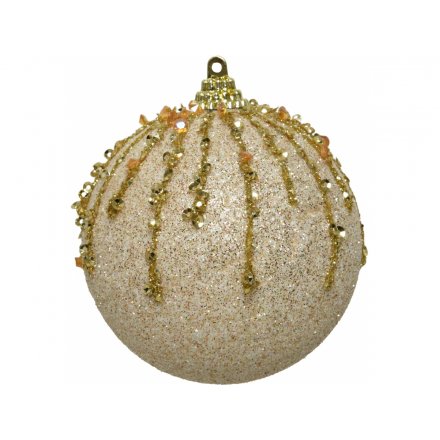 A glittery based bauble with an added golden sequin drip effect to it 