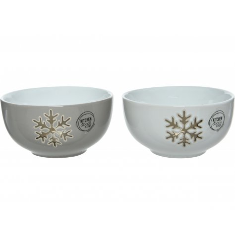 A wintery inspired mix of porcelain bowls with added gold star decals on each 