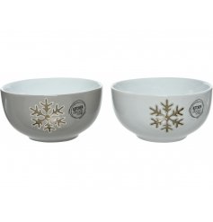  An assortment of porcelain based bowls, both decorated with a charming gold snowflake decal 
