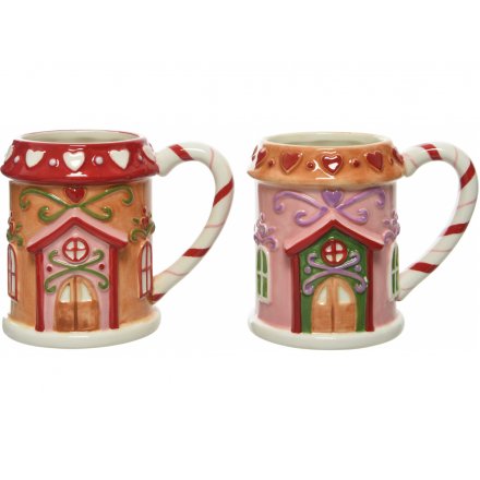 A delicious looking mix of gingerbread house shaped mugs, perfect for enjoying a Christmas Beverage! 
