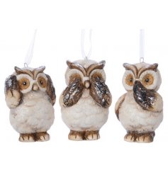 A charming mix of hanging owl figures, each posed with a See, Hear and Speak no evil look 