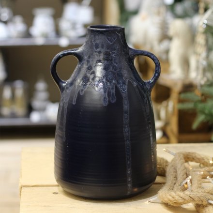 A stunningly simple smooth to the touch decorative Jug featuring a bold navy blue tone and reactive glaze drip finish 
