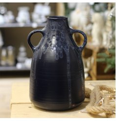  a shaped Decorative Jug with a bold navy blue tone and drip glaze to finish 