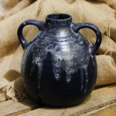 A stunningly simple smooth to the touch decorative Jug featuring a bold navy blue tone and reactive glaze drip finish 