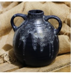 Perfect for bringing into any home with a Contemporary Setting, a shaped Decorative Jug with a bold navy tone and drip 