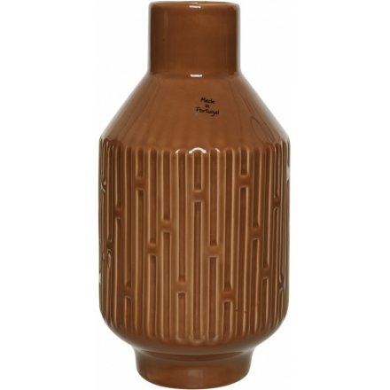An Earthen inspired decorative vase, set with an embossed decal and terracotta colouring 