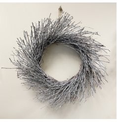 A charming rustic living round wreath with a subtle white washed finish.