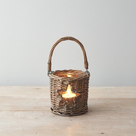 Sure to bring a Country Charm feel to any space of the home, a woven wicker candle holder with a small star window 