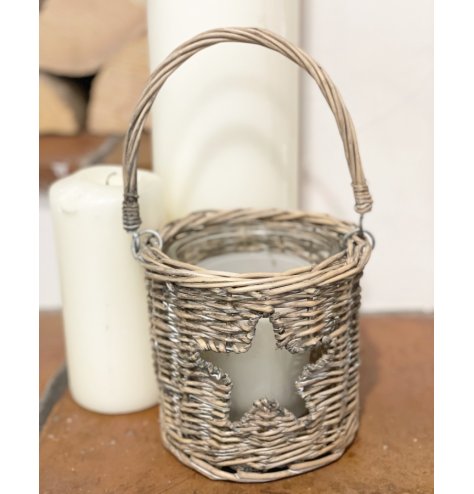  Sure to bring a Festive feel to any space of the home, a woven wicker candle holder with a small star window. 