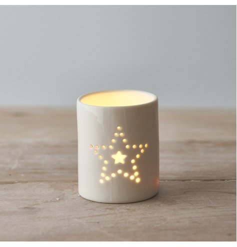 A Simple White Ceramic T-light Holder in White with Dotted Star Decal