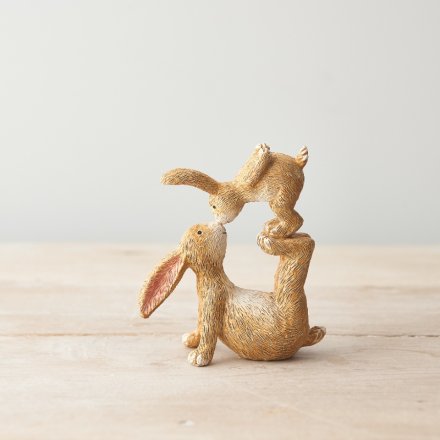 An adorably posed Resin Bunny and Baby figure, a sweet little accessory to bring to any home 