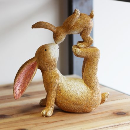 Perfect for adding a delightful touch to your Spring scenes and Easter Displays, a due of posed kissing bunnies! 