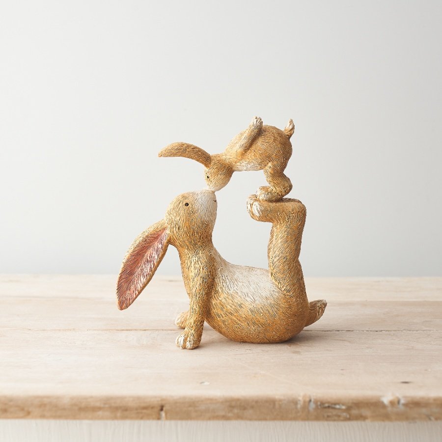 Perfect for adding a delightful touch to your Spring scenes and Easter Displays, a due of posed kissing bunnies! 