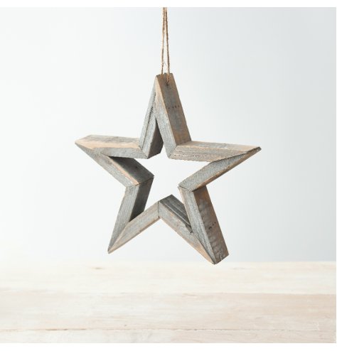 A rustic wooden grey star with a jute string perfect perfect for hanging