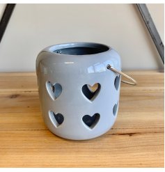   A sweet and simple little grey T-light holder set with cut heart decals 