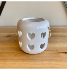  A sweet and simple little white T-light holder set with cut heart decals 