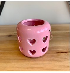 A sweet and simple little pink T-light holder set with cut heart decals 