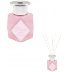 this Desire Boutique Reed Diffuser features a sleek clean look and silver cap decal 