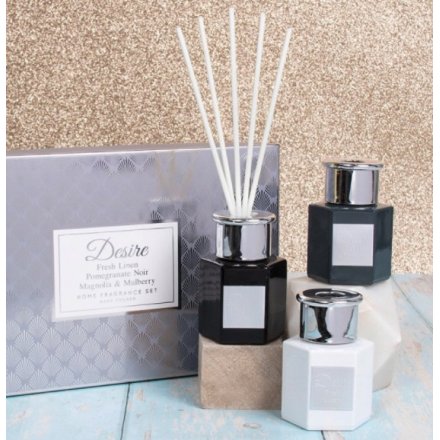  An assorted set of scented diffusers, each in their own soft coloured bottles 