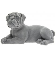 A gorgeously simple ornamental Laying Pug covered with a luxe grey velvet coating 