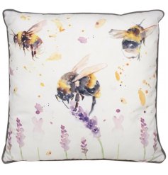  A delightful themed plump cushion displayed with a charming watercolour inspired bee print 