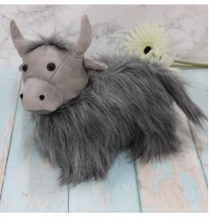 A grey toned faux fur covered Highland Cow doorstop with added leatherette accents 