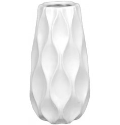  A sleek and simple themed decorative vase featuring a wavy embossed decal in a soft white hue 