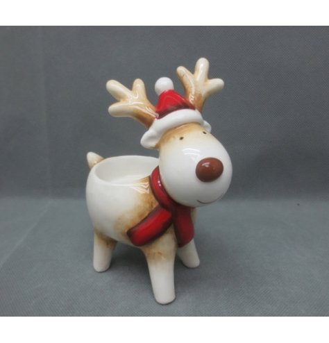 A brown and red toned ceramic reindeer tlight holder 