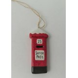 A quirky little hanging post box decoration with a red tone and Santa Post script text 