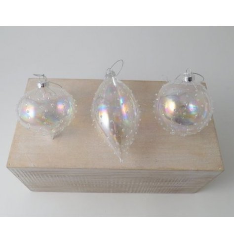 An assortment of stunning shaped glass baubles, each coated with an iridescent finish and bubble texture 