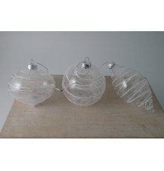 A luxe inspired mix of shaped baubles with an spun glass finish to each 