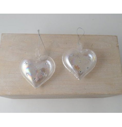 An sweet and simple clear glass heart hanging decoration with an iridescent coating and diamonte touch 
