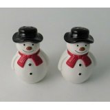 An assortment of Snowman Shaped Salt and Pepper Pots 