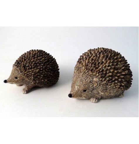 A charming little posed hedgehog figure with a subtle glittery finish for a wintered look 