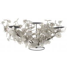 A black toned metal candle stand beautifully submerged with silver and grey foliage with a glittery finish   A stunning 