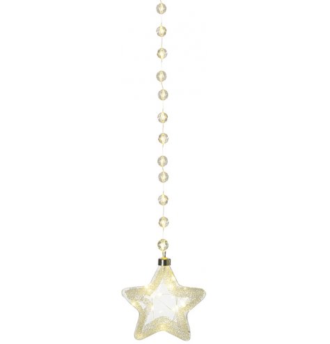 A hanging glass star with a beaded hanger and beautiful warm white led lights within 