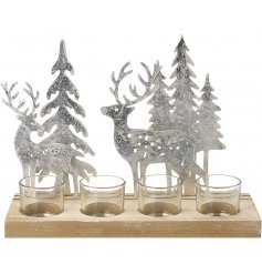 A gorgeous metal woodland and reindeer scene set upon a wood based candle display with distressed features and clear gla