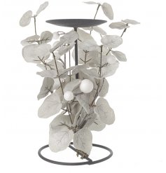 A black toned metal candle stand beautifully submerged with silver and grey foliage with a glittery finish 