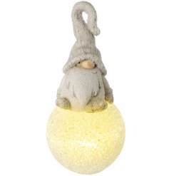  A cute character decoration to bring to your home during the festive season and provide a warming glow 