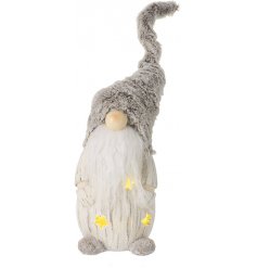 Set with a spiral faux fur hat and warm glowing LED display, this festive gonk figure is a must have for the home! 