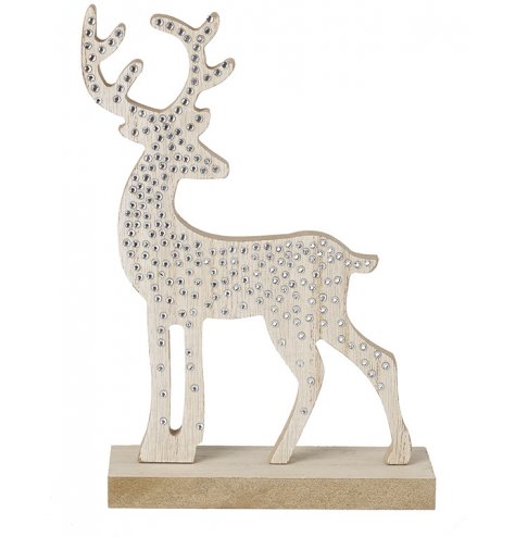 A nordic wooden stag with simple silver gems. 
