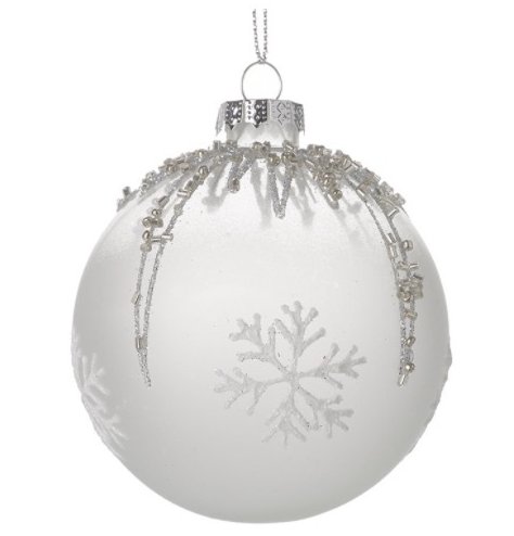 A snowflake pattered glass bauble with a shimmering of glitter and silver beads.