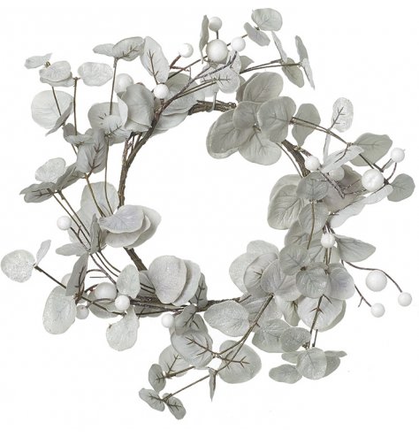 A  winter wreath in pale grey with white berries and a frosty glitter finish.